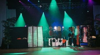 Sample of our current full theatrical on-stage set look which supports all the costumes, wigs, hand props and specials and spreads a maximum of 24" L x 16' D (Production Set and Lighting Design, Jim W