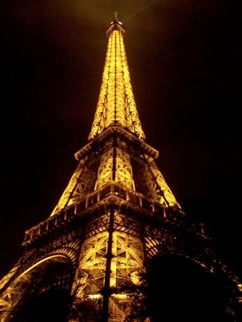 The Eiffel Tower at night. For five minutes, on the hour, the whole structure is illuminated with twinkling lights. Tres belle!