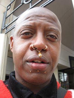 I met Zeus while I was taking photos at a street festival in Knoxville. Intrigued by his appearance, I asked him if I could take his picture. Zeus graciously said, 'yes.' (Next page, please.)