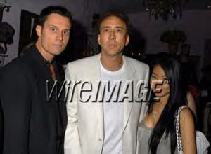 Keith Collins, Nicholas Cage & Wife Alice Kim at the Haven Hills, Hats Of For Cancer & Single Mom's charity event in Los Angeles, CA (photo credit- Barry King WireImage.com)