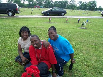 Pat, Linda and her son Travis visiting our father's grave - The late Rev. Willie Bell, former manager of The Bell Singers