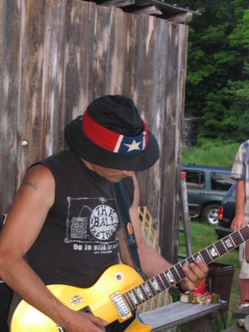 Kenny "Wayne" Howard, lead guitarist for the Ball Brothers. Slide, ride and slip inside. I got that.