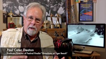 An Official Selection at over 20 film festivals and winner at six of them, Paul's "Showdown at Tiger Beach" was a finalist in the Gulf Coast Film and Video Festival 2021. He is shown here giving a video introduction. Andach Mischela Photo