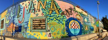 A brightly painted mural lends to the jubilant atmosphere at a seaside playground in Zuljana, Croatia. This is where PCD joined Barbara Dive Centre to film underwater scenes for his "Wine Diving in Croatia" documentary. Paul Cater Deaton Photo