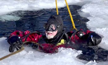 "Breaking the ice" in Michigan's Upper Peninsula, PCD underwent training in drysuit and ice diving with Bob Berg. Photo: Brian Bangert