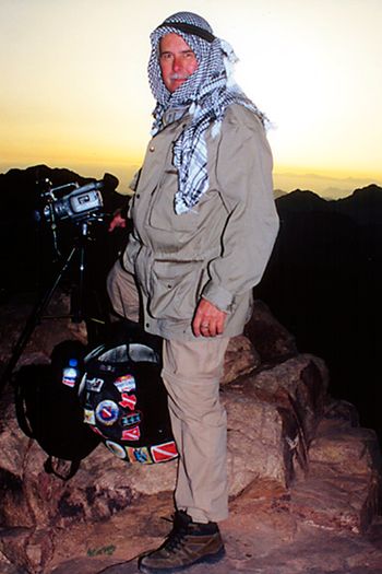 "Paulie of Arabia" catches the sunrise from the summit of Mt. Sinai during the 2002 filming of "Egypt - Karnak to Coral Reef." Photo: Randy Saletnik