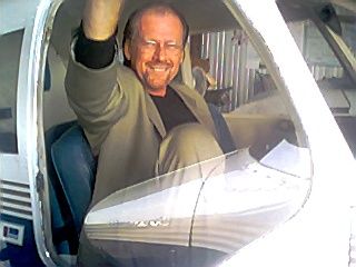 Grenada, MS--Tom loves checking out Pastor Bullion's plane. Tom almost had his pilot license...almost....