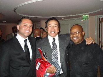 Co- Md's Kevin Teasley and Lamont Sydnor with Smokey Robinson after the Smokey Robinson Foundation Concert ("The Unit" served as backing band)