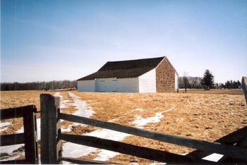Col. Stone's brigade formed an L-shaped battle line near McPherson's barn. The 150th PA faced west toward Willoughby's Run, while the 149th and 143rd PA lined up behind the Chamberburg Pike facing no