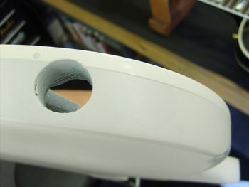The bass is now in white primer. The binding was airbrushed to camouflage the area where the second output jack once was....