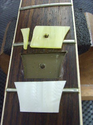 While the new inlays closely match the outlines of the old ones, some minor reshaping of the inlay and cavity is necessary.