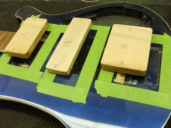 While the owner wants to keep the aftermarket Bartolini pickups, I chose to fill the old amateur routes with fresh maple, and reroute the cavities nice and clean....