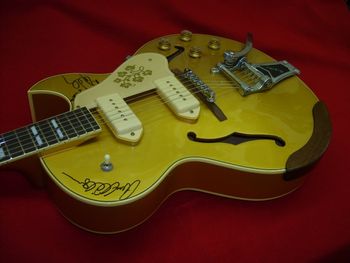 This armrest is held in place by heavyduty 3M double-sided tape, per the customer's request. He prefered not to have extra mounting holes drilled in the guitar.....
