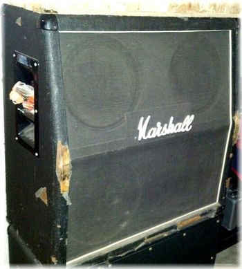 This 4-12 Marshall Cab has rocked a lot of people and smelled a lot of stages, and it still sounds great