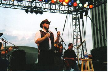 Opening for Rosanne Cash at The Empire Plaza in Albany, NY: Red Beaumont, guitar; Frank Orsini, fiddle; Jeff Sohn, bass