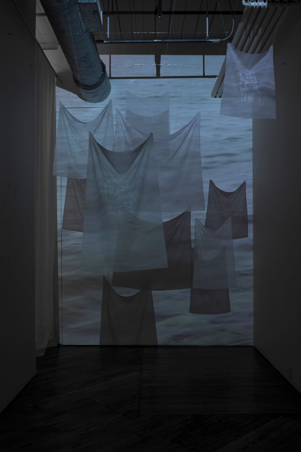 "By Way of a Bridge" 2017, Machine embroidery on polyester fabric, projection, wind