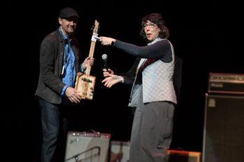 Receiving the Best Guitarist Award at the 2019 International Blues Challenge from Blues Foundation President Barbara Newman