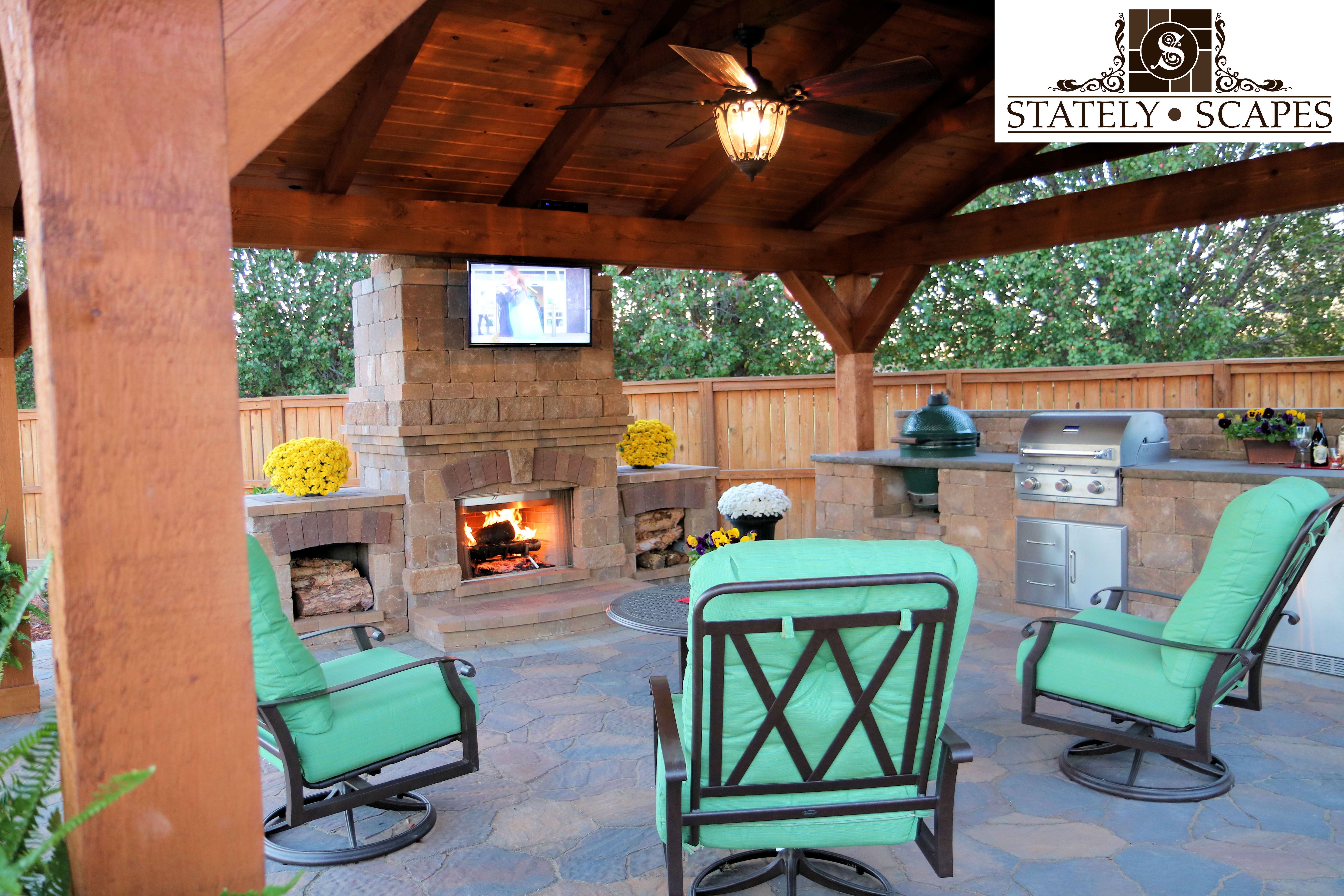 Outdoor living area with Belgard Bristol fireplace.
