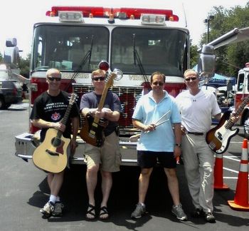 Fightfighters of NoVA Family Day 6/8/08: No, that's not Engine 14 behind us but that's Engine14 in the front (trying to stay cool!)...