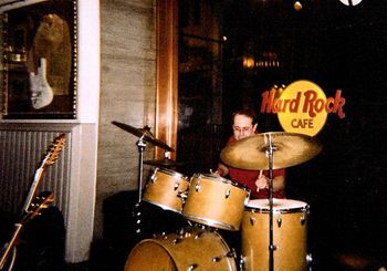 Here's Rob, pounding on his Slingerland set with Engine14 at the Hard Rock Café in Washington, D.C. Rob's Slingerland has served him well for many years. He uses a 22” medium ride cymbal which is a superb all-around ride and provides a great mid-range pitch. Rob uses a Pearl P2000C Eliminator Chain Drive Bass Drum Pedal.