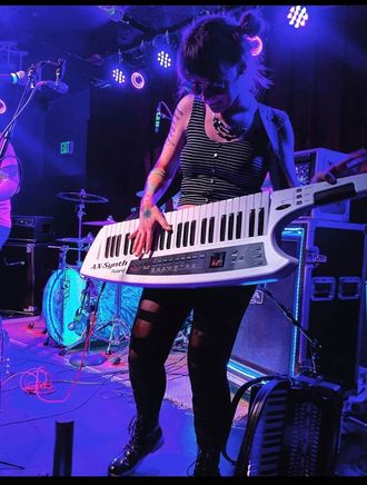 "You are the only person I know who can kick ass at a Gwen Stefani cover and it blows my fucking mind. Play the piano like a goddamned genius and I don't even know how you play that thing on stage while also having to play a trumpet." - Shannon Wallace