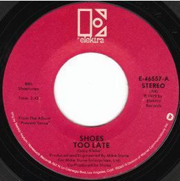 Label for "Too Late" with "Now and Then" on the flip side, the 1st US single release from the "Present Tense" LP in 1979 on Elektra Records.