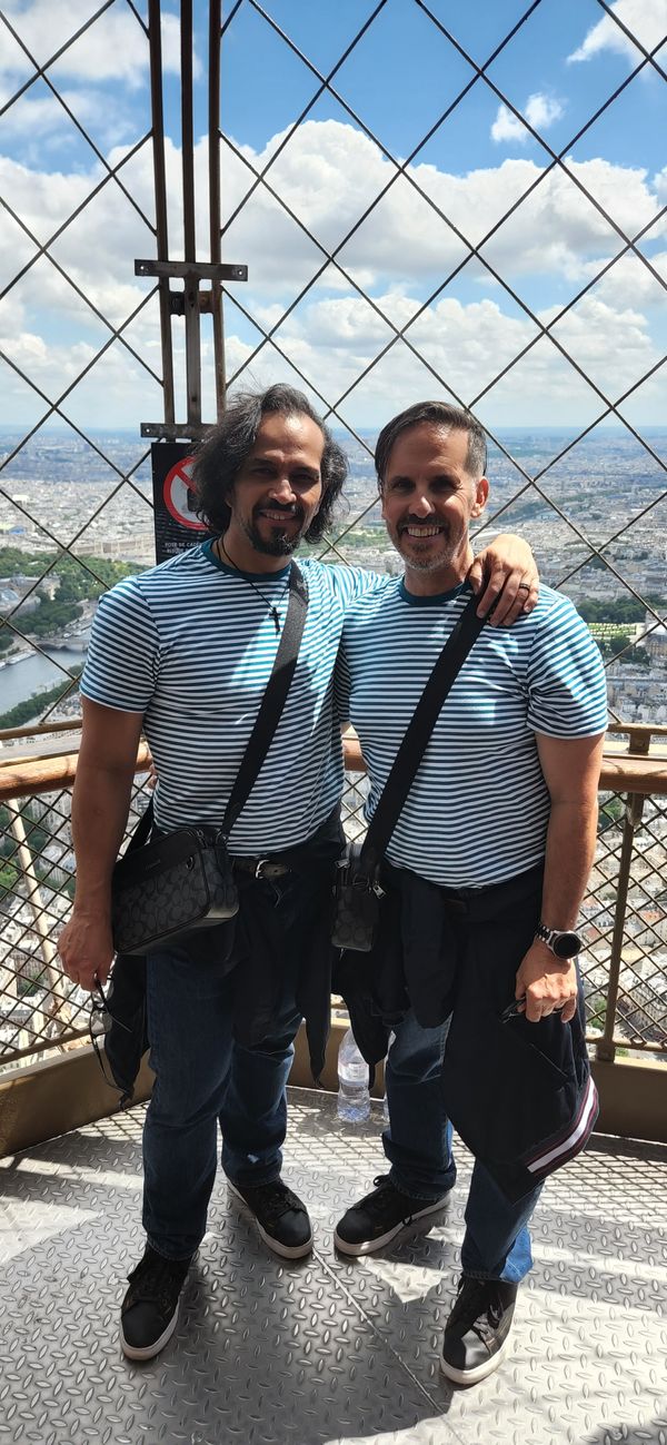Sidow Sobrino with husband Richard a top la tour Eiffel in Paris, France