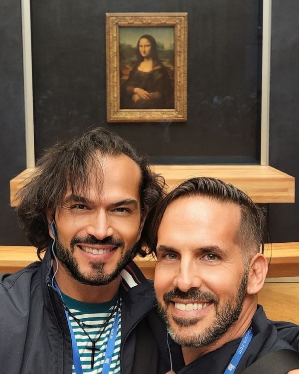 Sidow Sobrino with husband Richard in front of Leonardo da Vinci's painting La Joconde at the Louvre Museum in Paris, France