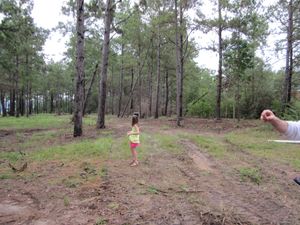 My daughter surveying the property in Husser, LA. Yep- lots to do here but it has promise!
