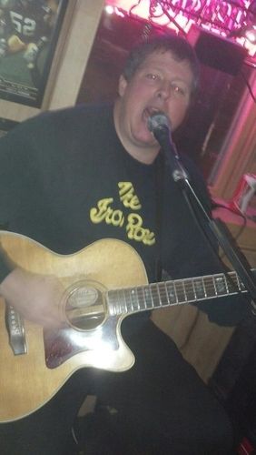 Belting it out -- Lettin' it rip at The Front Row's annual Fat Tuesday party in 2013. Photo courtesy of Adam Leming