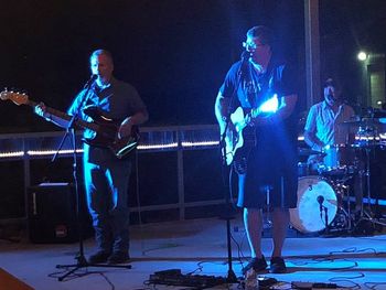 Rockin' the patio at Confluence -- Enjoying a hot summer night outside with a large crowd at Confluence Brewing Company in August, 2019.