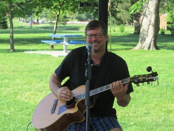 Happy behind the mic - Enjoying an evening performing at The Jasper Winery in Des Moines in June of 2015.