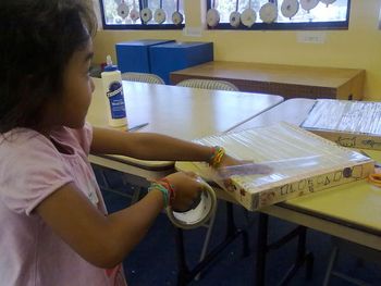 FRAME DRUM - Here my K student does it all by herself...she was one of the ONLY ones! That's why I say older the better on this one...but again, with assistance they can all do it