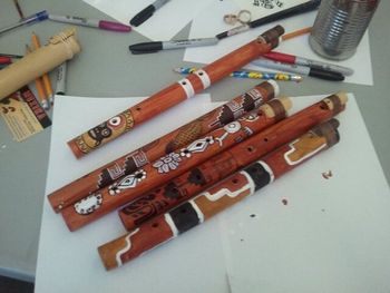 ADULT's work: my most requested workshop "Bamboo Flute"- same flute but these were made by my adult classes using natural pigments we made!!!