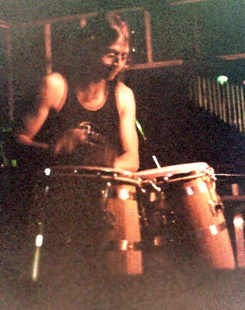 Doug Grube playing congas on "Survival"