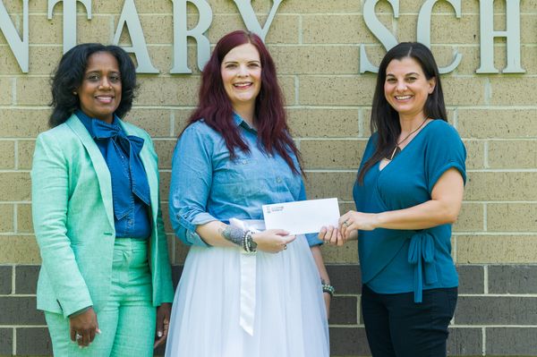 Director Melissa Griffin presents the Maya Levy Art Education Grant to Juline Neal of DC Reeves Elementary School.
From left: DC Reeves Elementary School Principal Tamara Whittington, Art Teacher Juline Neal, and Hammond Regional Arts Center Executive Director Melissa Griffin. Photo by Phillip Colwart Photography