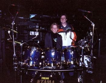 Heather and Seán on stage at Liberty's DeVitto's drumset. 2001, First Union Center, Philadelphia, PA photographer DeVItto
