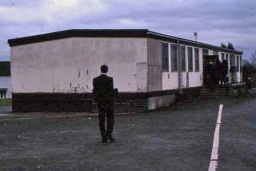 A COLLEAGUE APPROACHES A POSSIBLE LOCATION