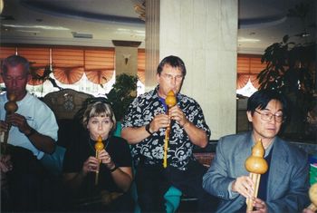 Whales China Tour - Art Springs, Kelley Hart Jenkins and Me getting a music lesson from a professor at University of Ethnic Studies at Kunming.