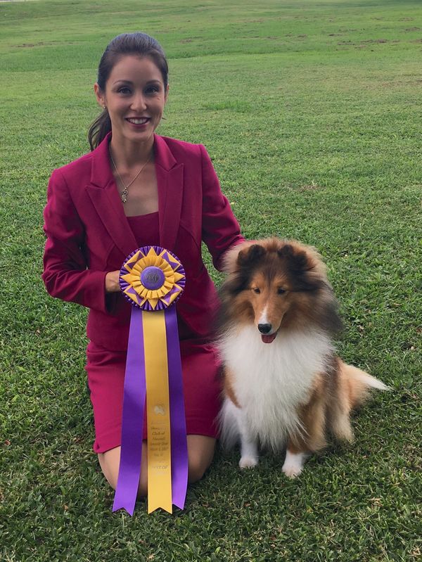 Reiko's lovely Handler Jennifer Gonzales poses with Reiko in their winning photo.