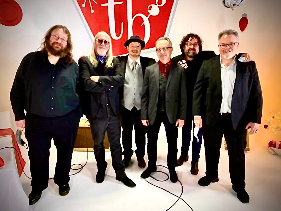 The Blue Christmas crew ! From left to right : Chuck Bartels, bass- Johnny Evans, saxophone- TB,vocals- Jimmie Bones Piano- Todd Glass, drums- and Rich Hwang, guitars