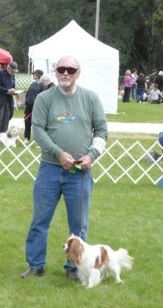 Thayer with Excalibur The Heat Is On "Thio" after a qualifying run for the Companion Dog obedience title!