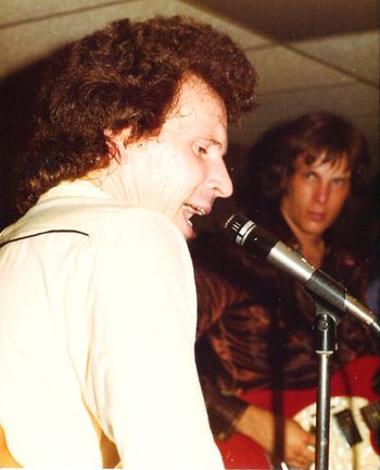 Gary Stewart and Bob at a concert to celebrate "She's Actin' Single" hitting #1 on Billboard. 1976. It is hard to see here, but I am playing my 1966 customized Fender Mustang with Fender Humbucking pickups. What a screaming guitar!!