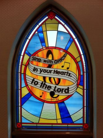 Gorgeous musical stained glass, located behind the choir stalls in Parish of the Good Shepherd, Mount Pearl, NL.