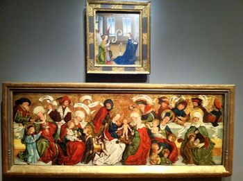 The bottom painting is called The Holy Kinship (circa 1500), and shows Jesus's family tree based on Mary's family. Fascinating picture!