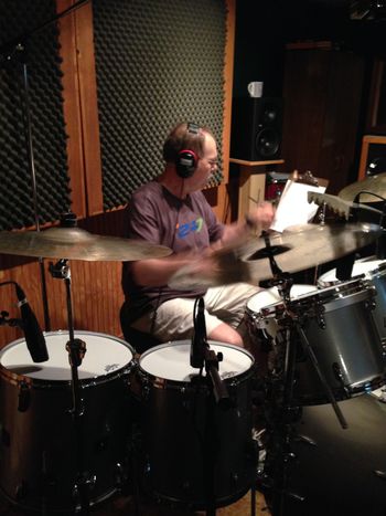 Steve Holland plays kit and hand percussion on the tracks. Nothing harder than trying to photograph a drummer...