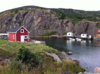 One of our favourite places! Quidi Vidi is a little fishing village located within St. John's, NL. To the left is the city, and to the right is the ocean. This spot is called the Gut.