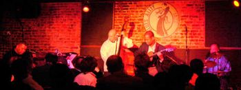 Earl Klugh Quartet. (l-r) Al Duncan-keys, flglhrn, trombone, Scott Glazer-bass, Earl Klugh-guitar and Yonrico Scott-drums. Blues Alley, Washington, D.C. 2007