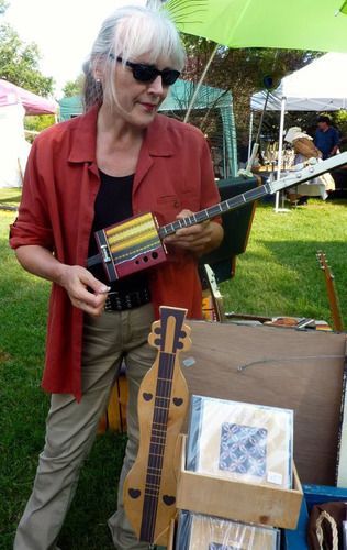 With 2-string strum stick at Folk Music Festival / Old Buchanan Log House / Nashville, TN Sept. 2012 Photo: Lora Abel