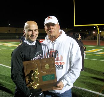 Coach Todd Filtz & I holding another Maple trophy for him! Maple Heights beats Olmsted Falls, 48-16 MUSTANG POWER! 11.19.2010